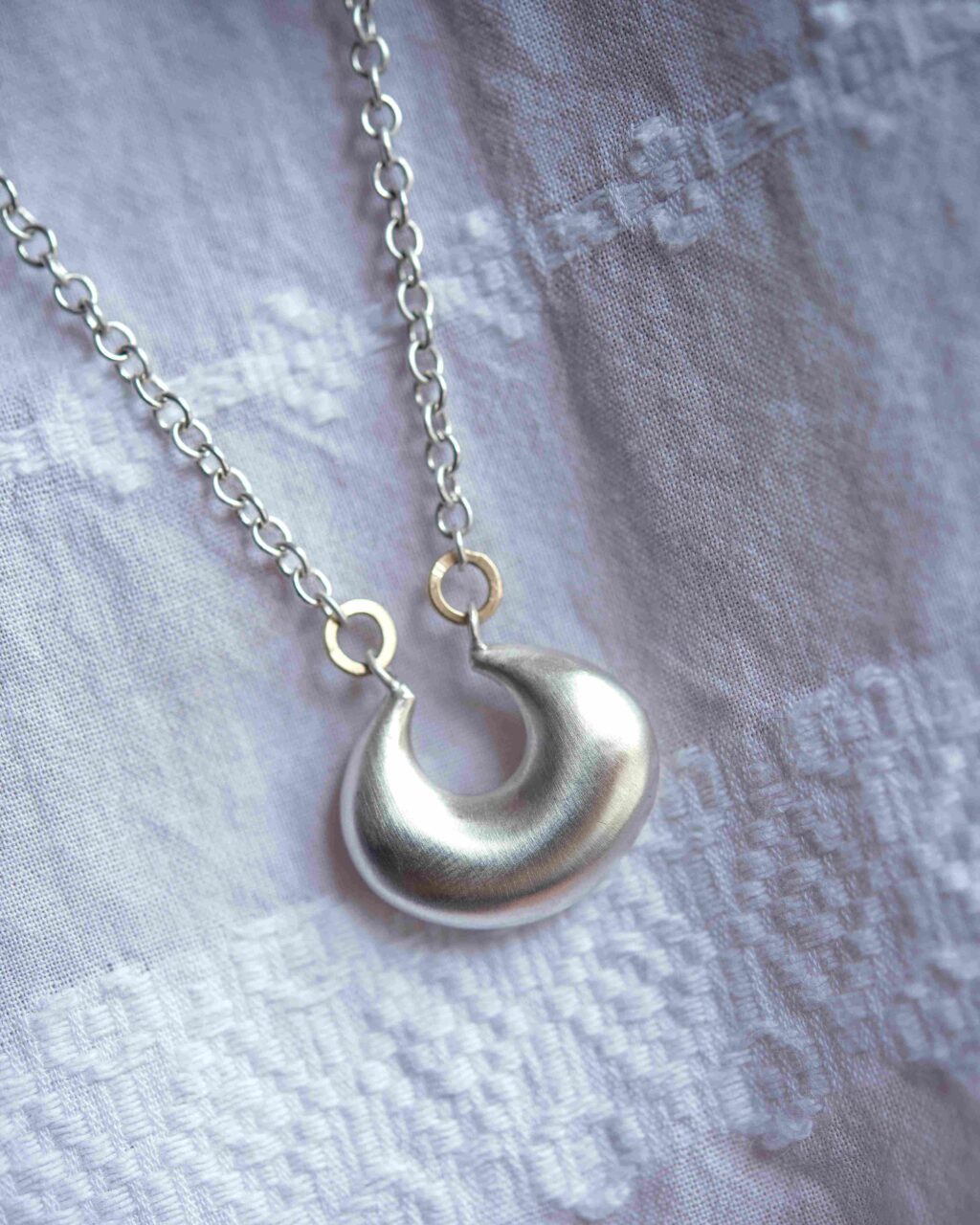 large crescent pendant