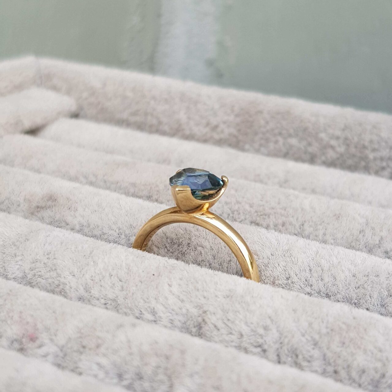 Teal-Pear-Sapphire-Blue-Engagement-Ring-Claw-Cups