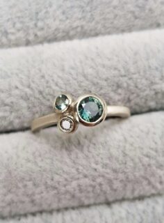 Teal Sapphire and Diamond Trilogy Cluster in White Gold