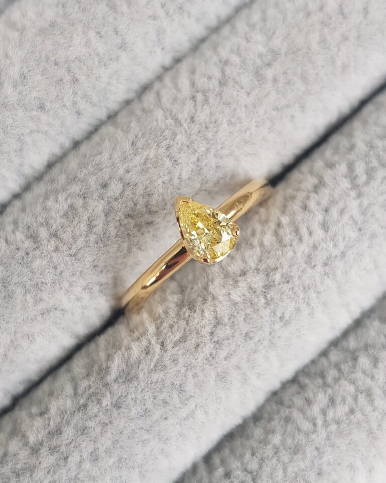 yellow pear diamond engagement ring