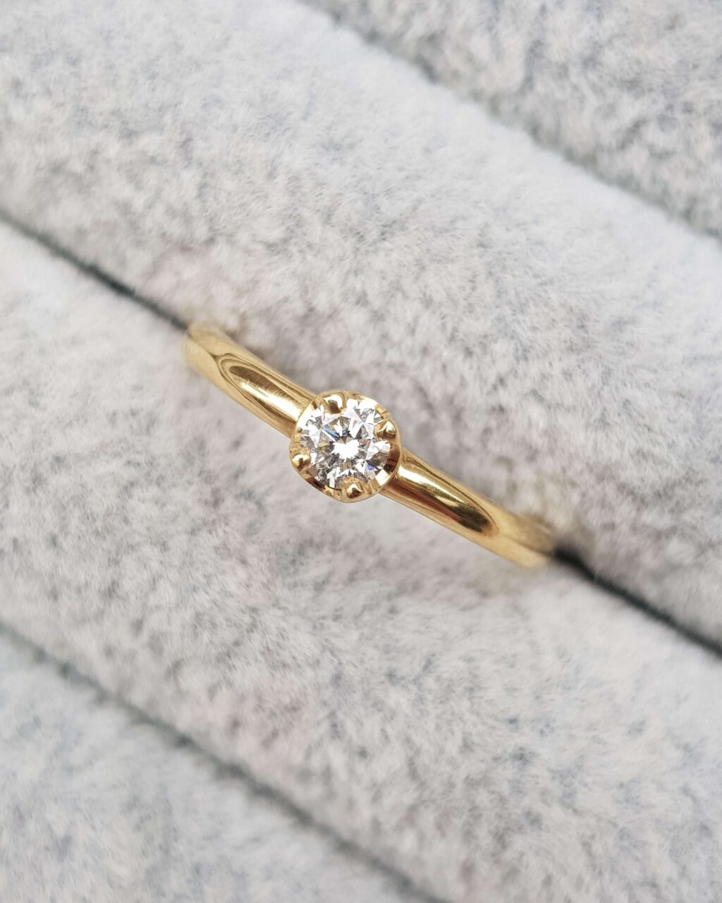 Gold and Diamond Solitaire Engagement Ring