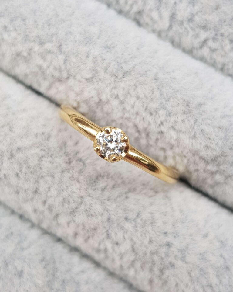 Gold and Diamond Solitaire Engagement Ring