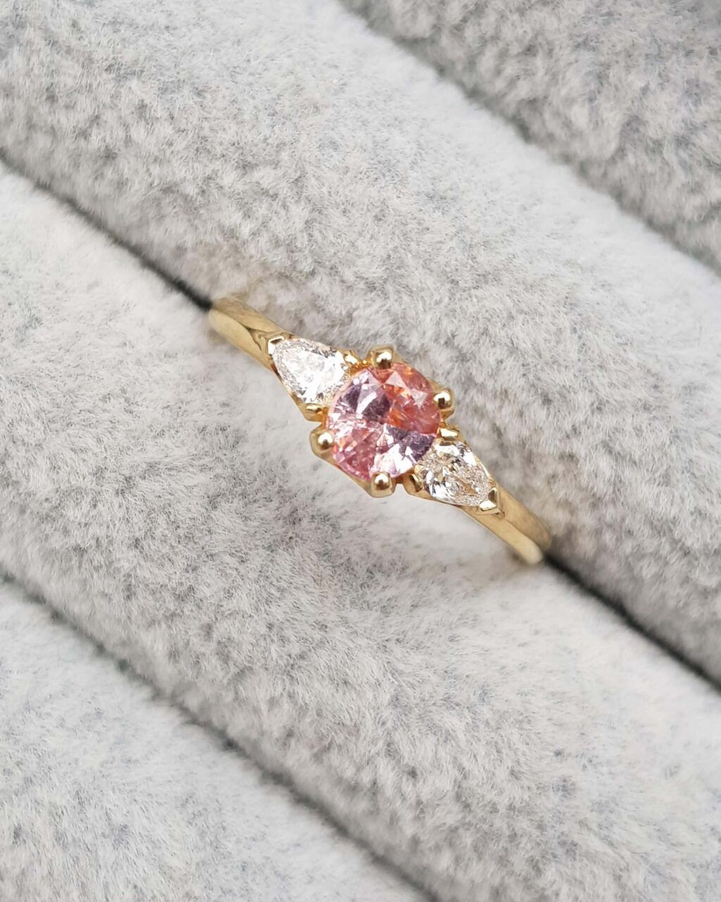 Peach Pink Oval Sapphire Diamond Trilogy Engagement Ring