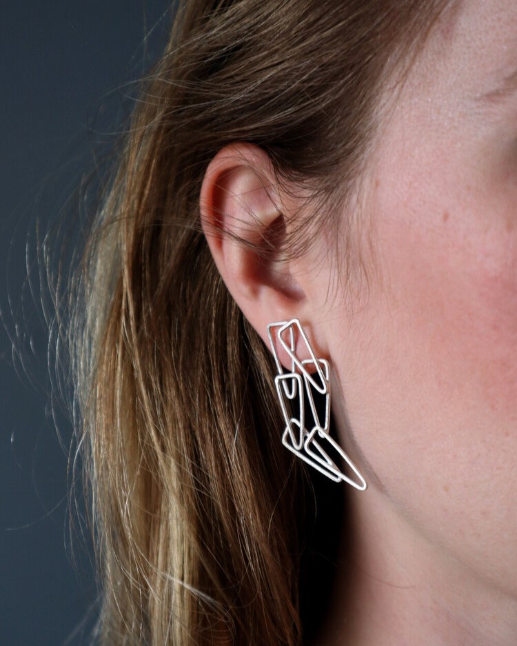 Silver triangle statement earrings
