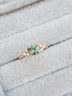 Green Sapphire With Dimond Trios Engagement Ring