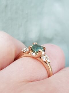 Green Sapphire With Dimond Trios Engagement Ring