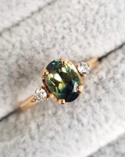 Oval Green Sapphire and Diamond Trilogy Engagement Ring