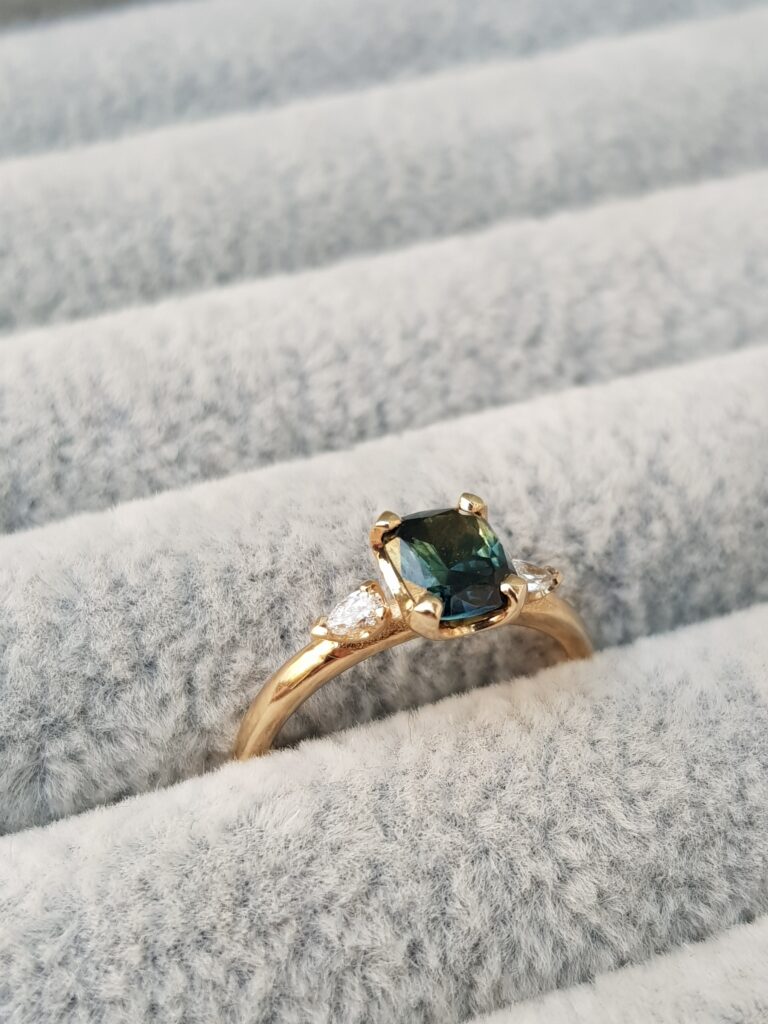 Teal Sapphire and Pear Trilogy Engagement Ring