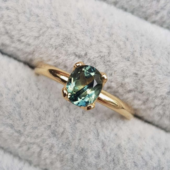 The Artist's Green Sapphire Oval Engagement Ring