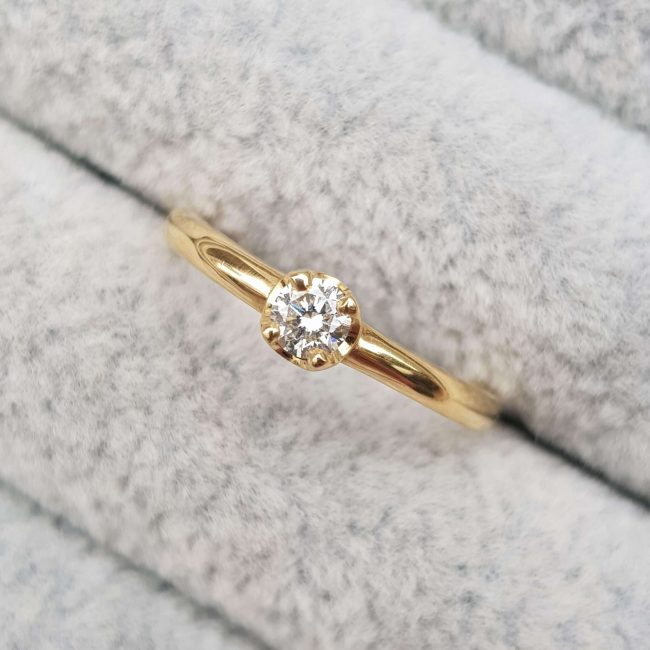 Gold and Diamond Solitaire Engagement Ring